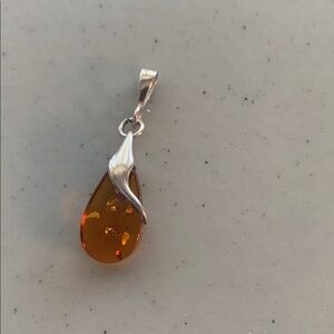 Amber Teardrop Pendant with Silver Accent